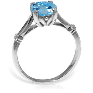 14K. SOLID GOLD SOLITAIRE RING WITH BLUE TOPAZ (White Gold)